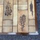 Table basse en bois et céramique herbier