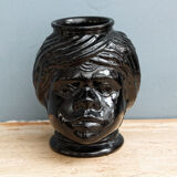 Molded glass vase, nubian's head