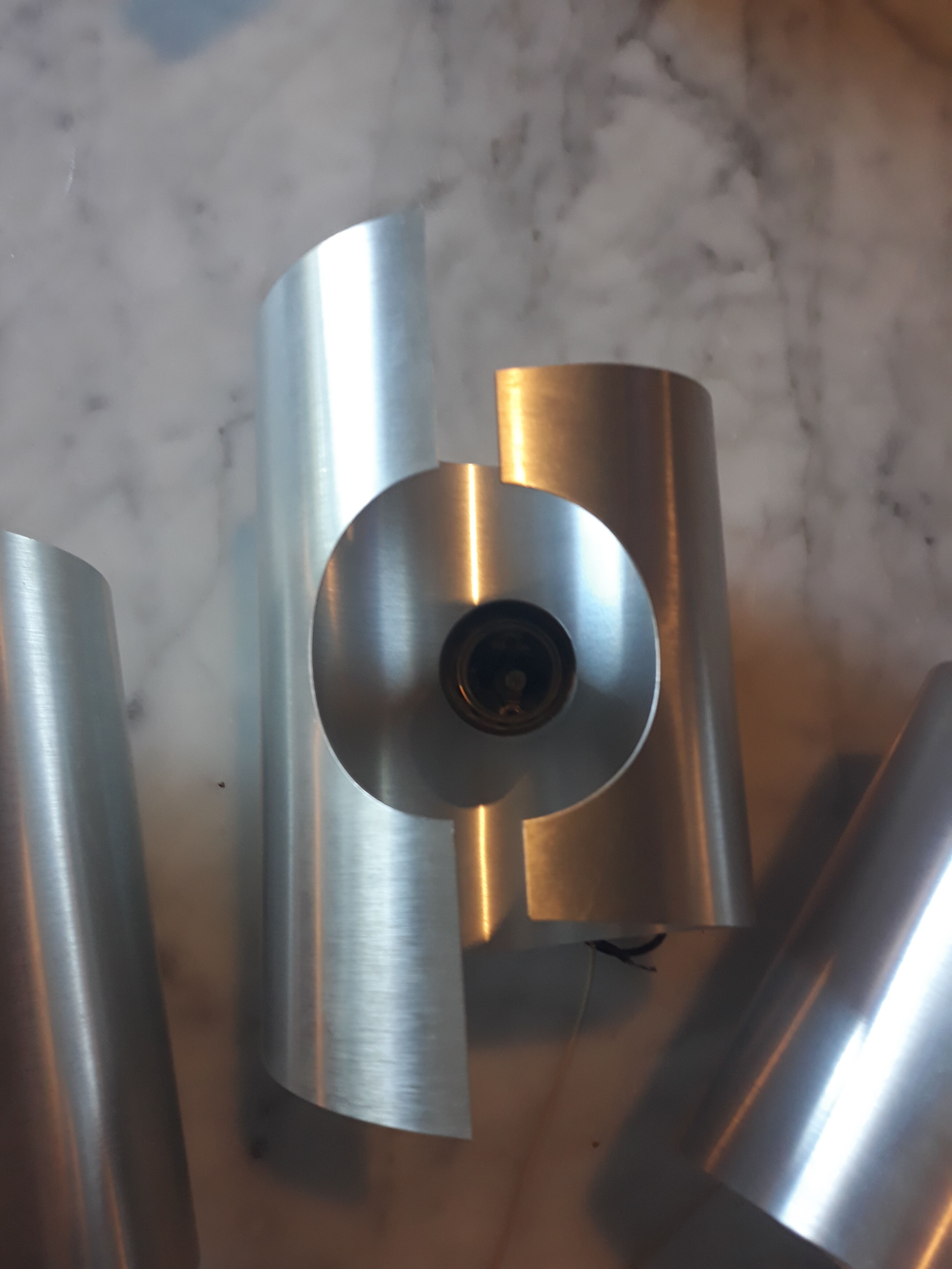 Brushed aluminum wall lamps in the 70