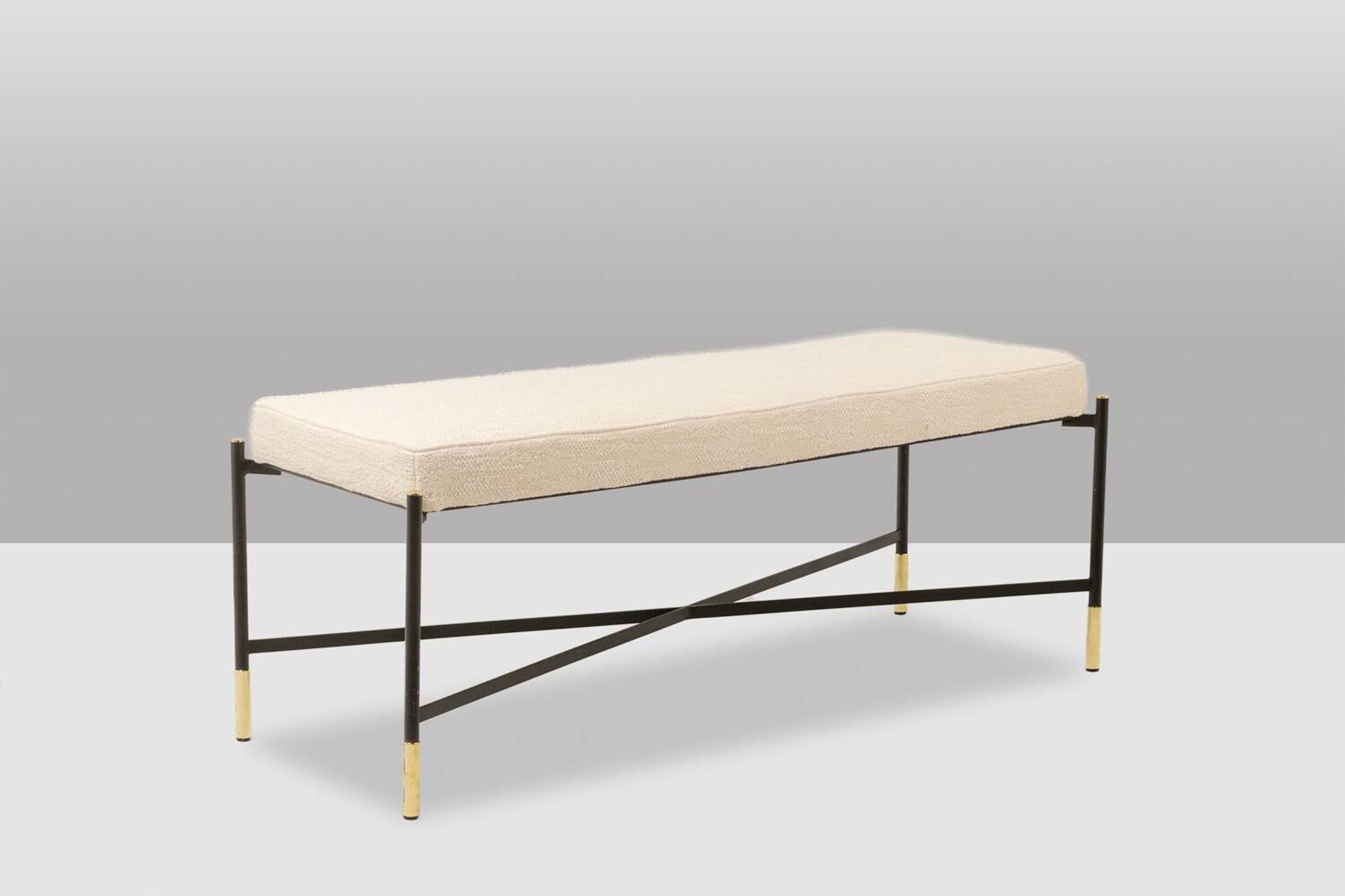 Pair of white benches, in lacquered and gilded metal. 2000s.