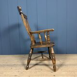 Brown English Windsor armchair with high back