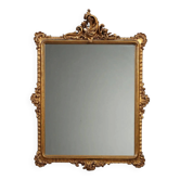 Antique Rococo-style mirror in carved gilded wood, 20th century.
