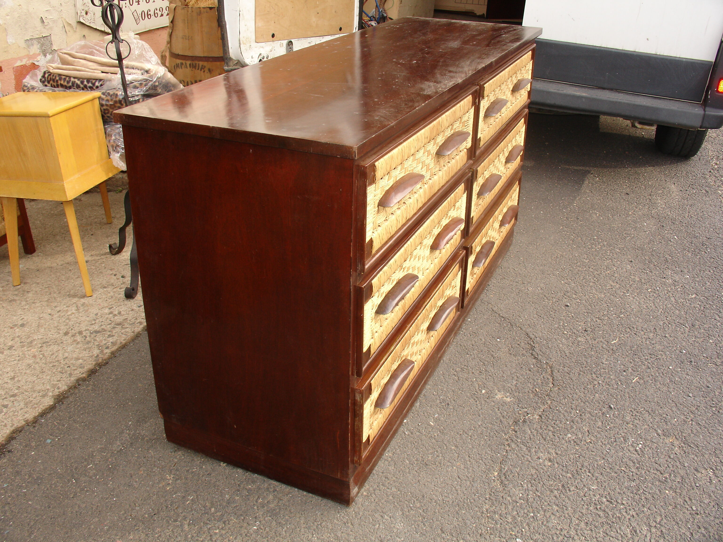 Six-drawer mahogany and straw chest of drawers, circa 1950, made in Mexico