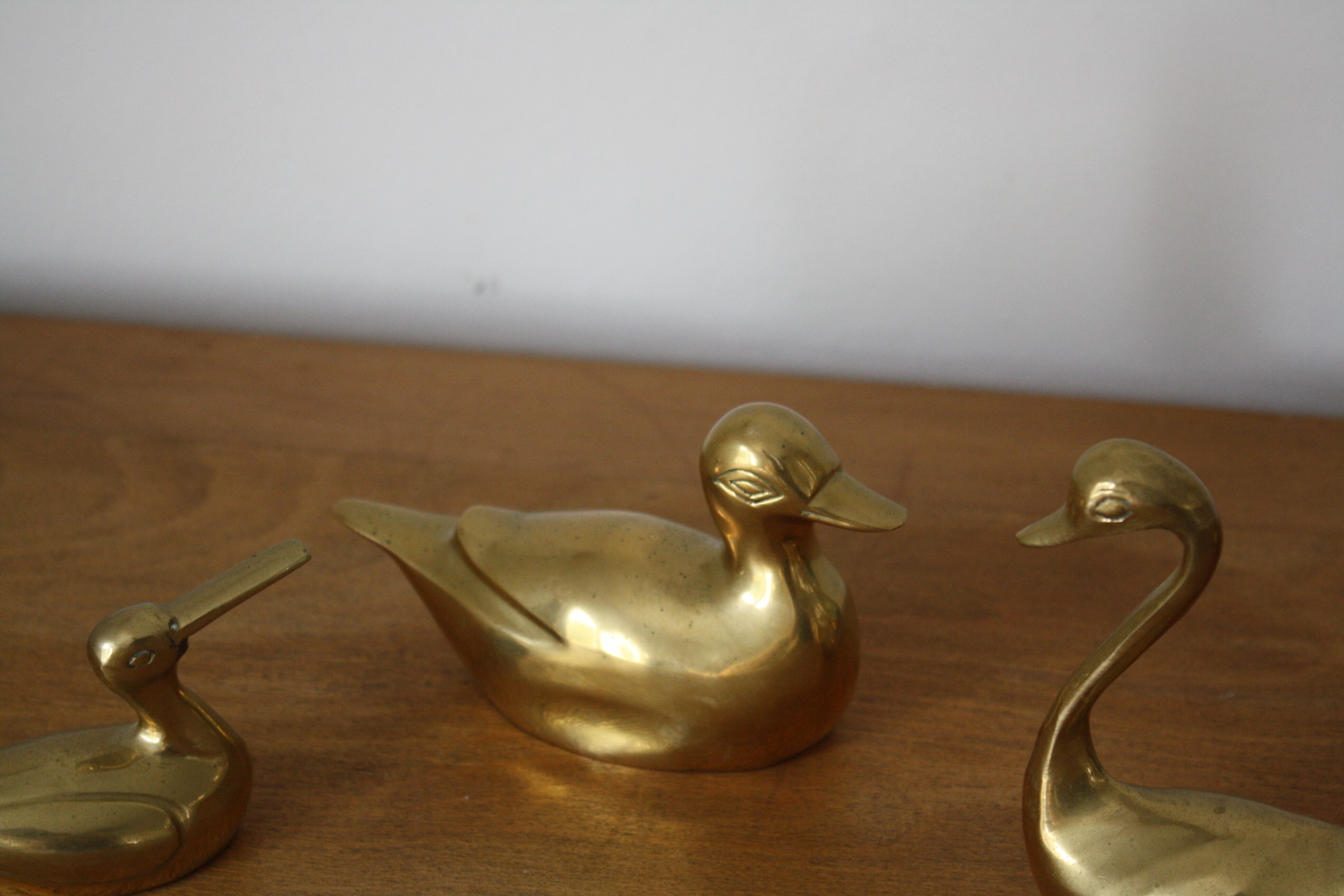 Set of 2 ducks and 1 brass swan