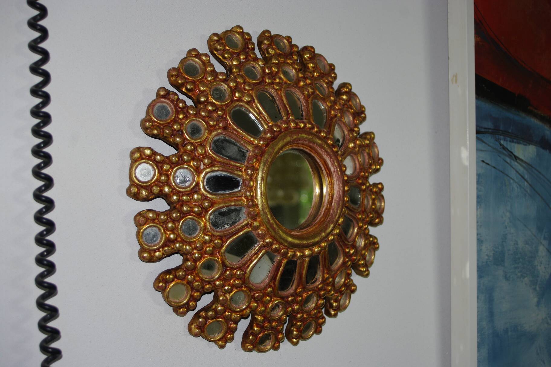 Vintage multi-faceted witch mirror in golden wood 1960 rare