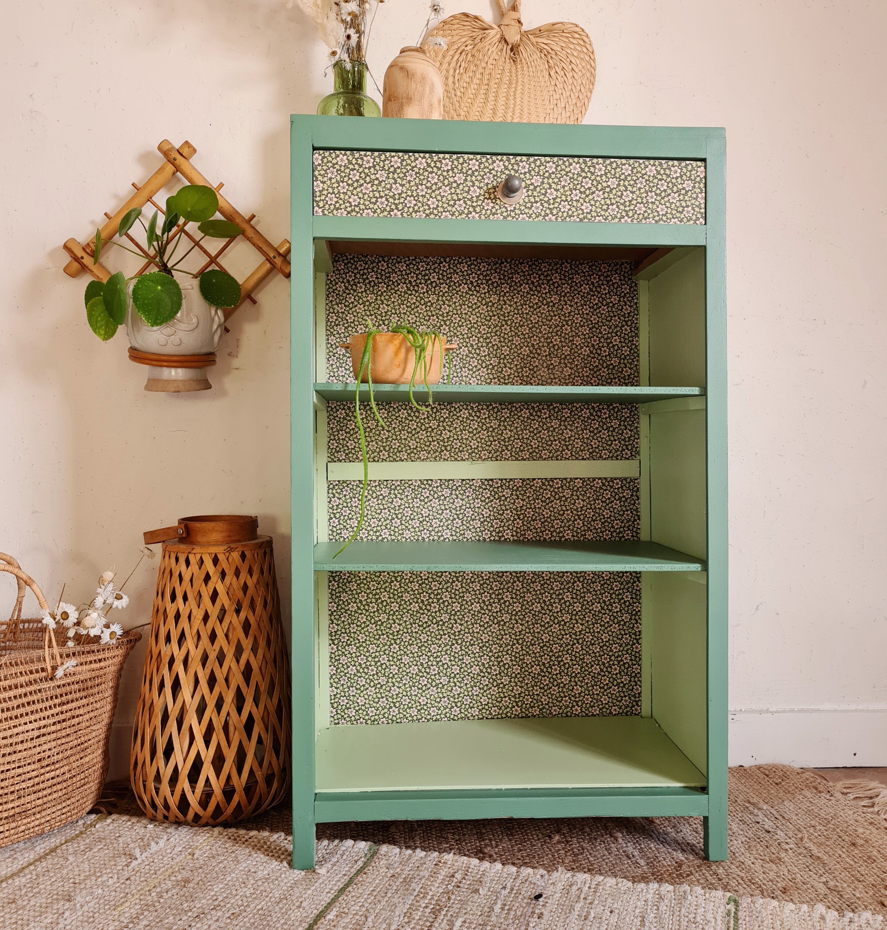 Renovated library shelf green color and floral atmosphere