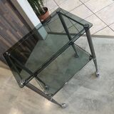 Vintage 1950s silver metal bar cart with wheels and two glass shelves