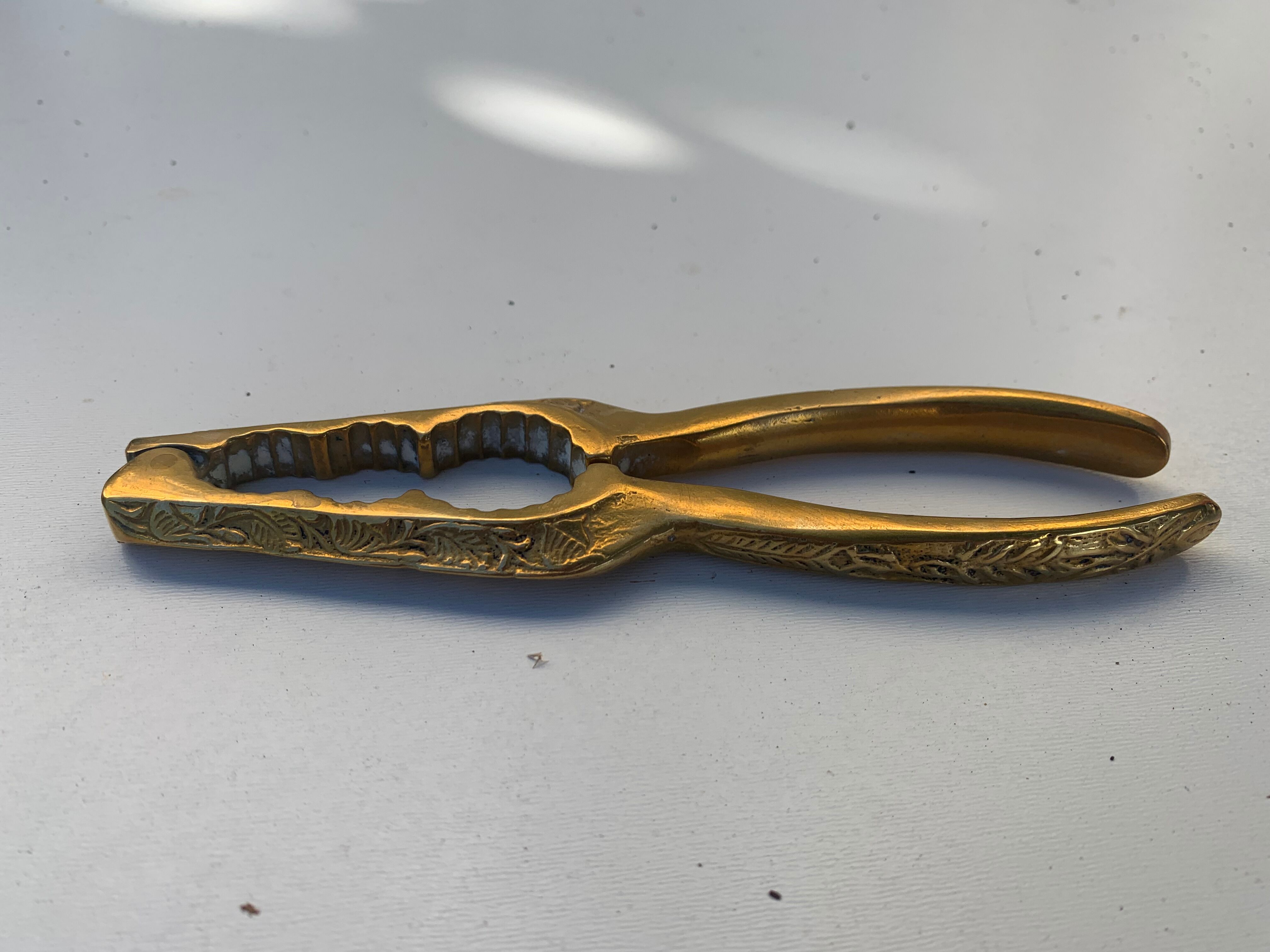 Nutcracker, vintage chiseled golden brass