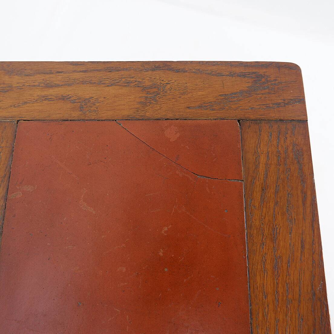 Vintage wooden side table with terracotta top