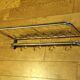 Train luggage rack style coat rack