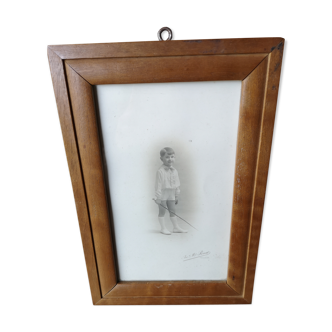 Photo former child under frame