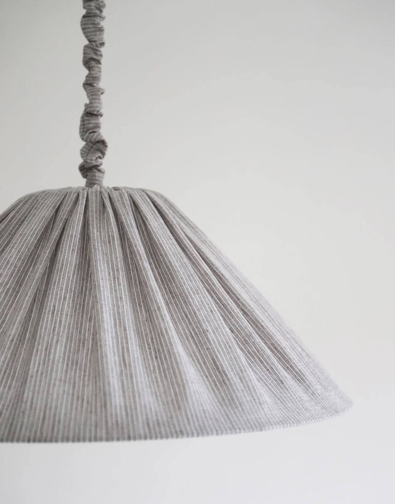 "Malala" pleated linen and cotton suspension with fine classic grey stripes.