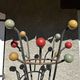 Ancien portemanteau en fer forgé type clé de sol par Roger Féraud