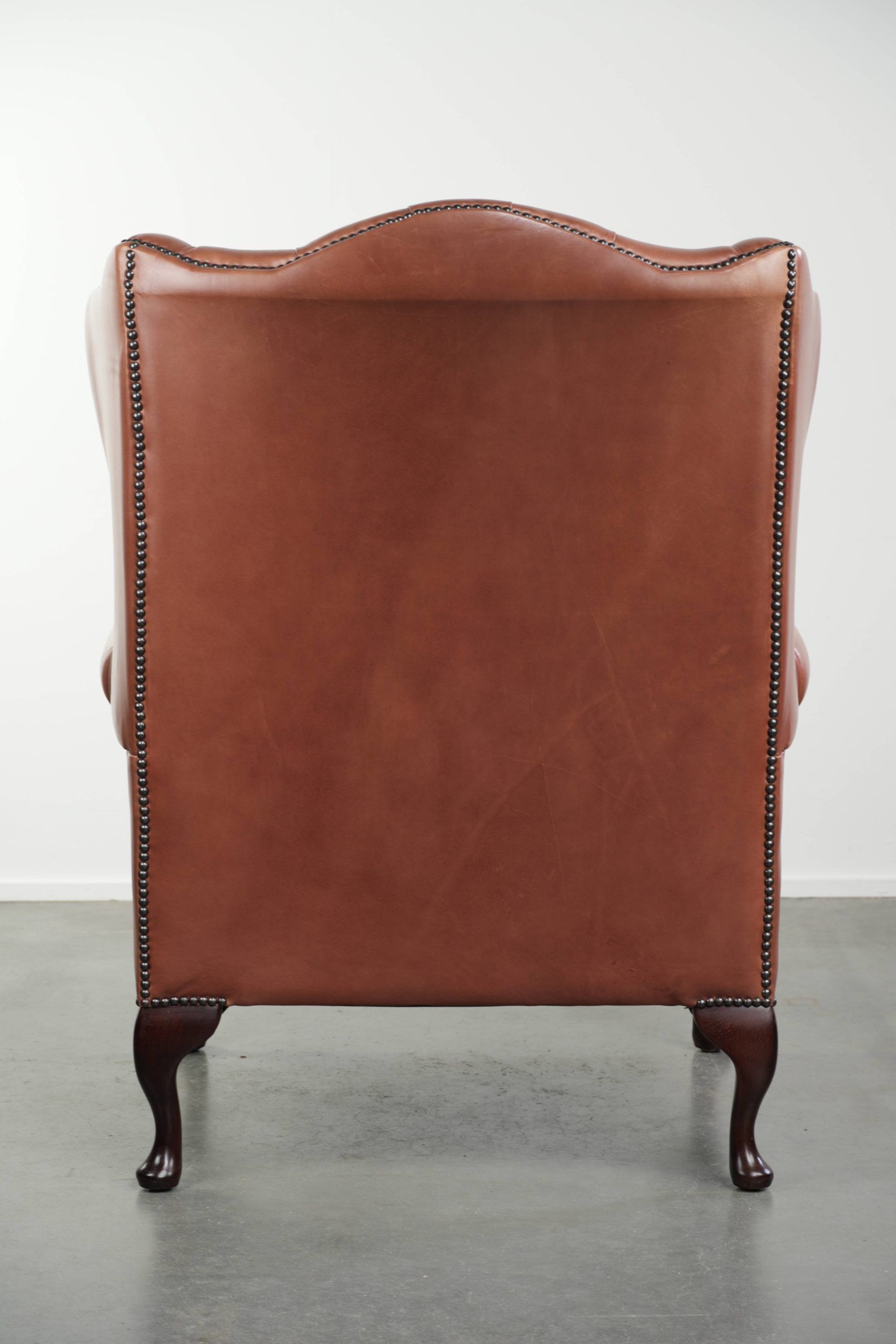 Classic English cowhide button seat chesterfield wingback armchair