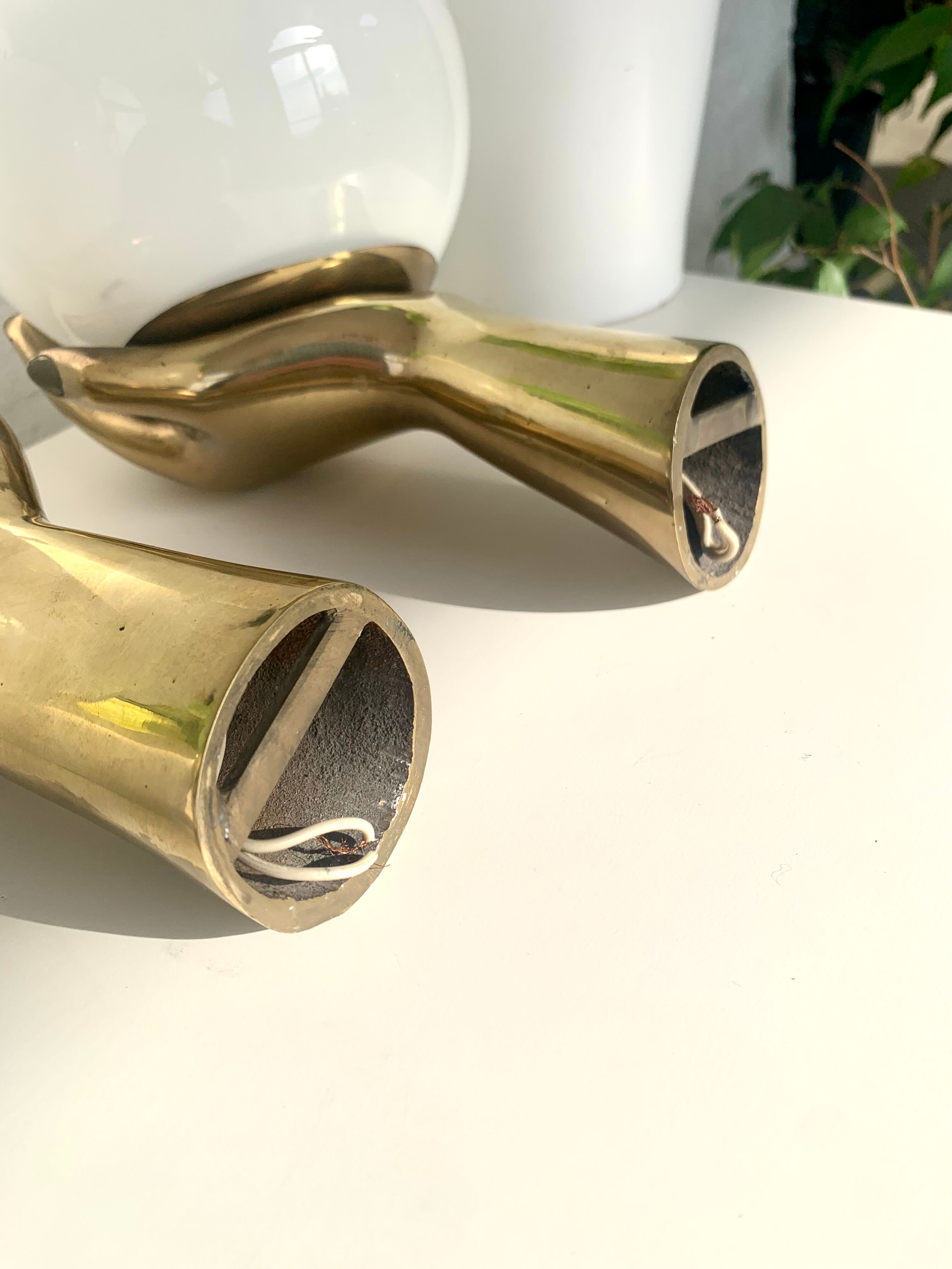 Pair of brass "hands" wall lamps, Arlus 1960