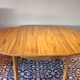 able to eat vintage round in formica imitation teak, with hidden extension, Scandinavian style