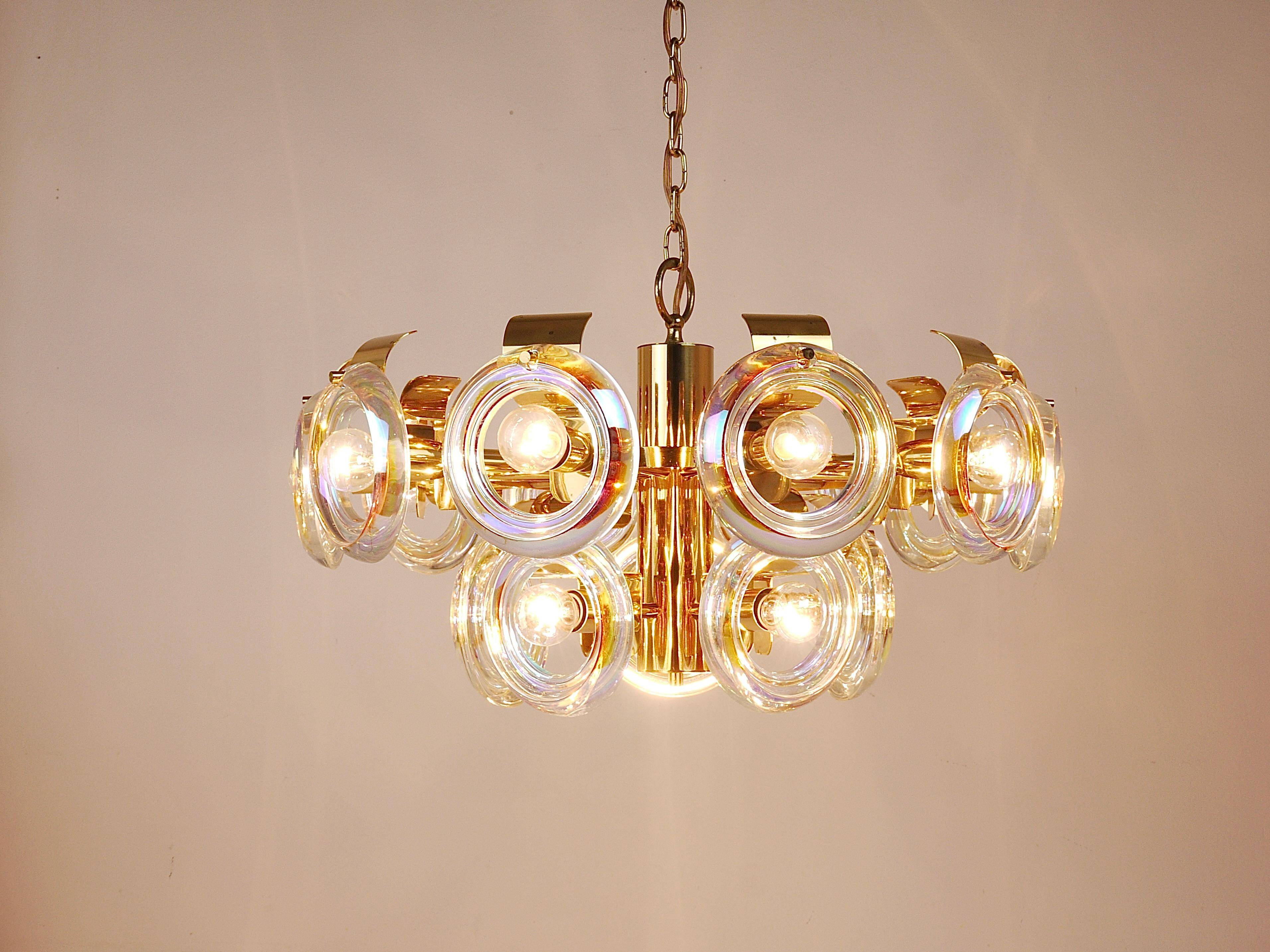 Large brass chandelier by Oscar Torlasco, rainbow optical glass rings, Italy, 1970s.