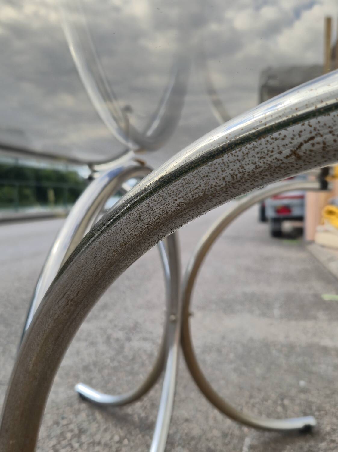 Vintage oval design table in smoked glass and chrome legs