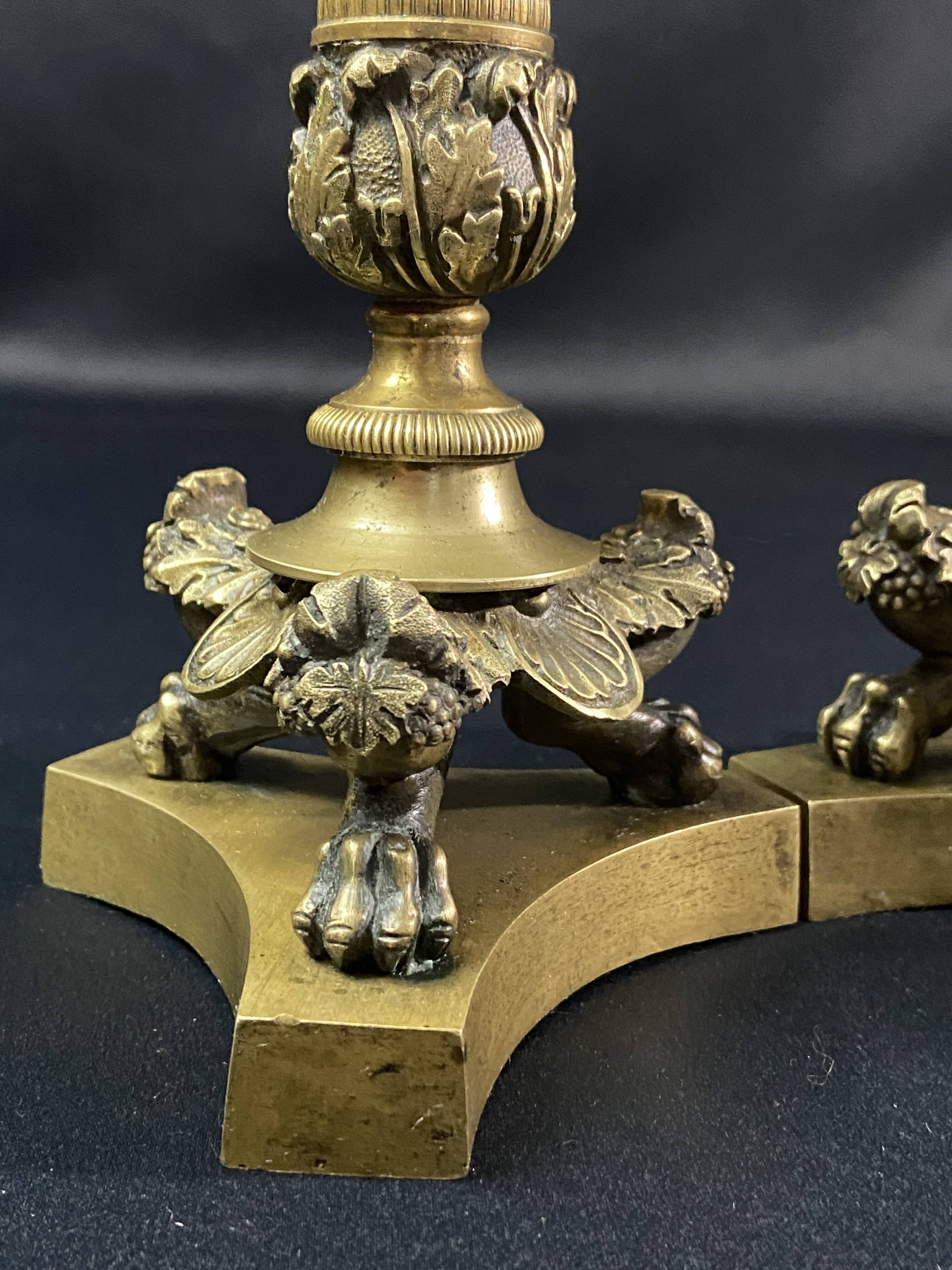 Pair of gilt and chiseled bronze candlesticks from the Restoration period