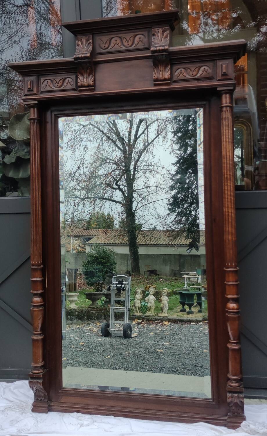 Old large carved wooden mirror