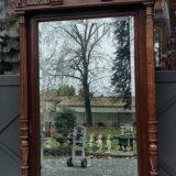 Old large carved wooden mirror