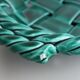 Green braided earthenware cut