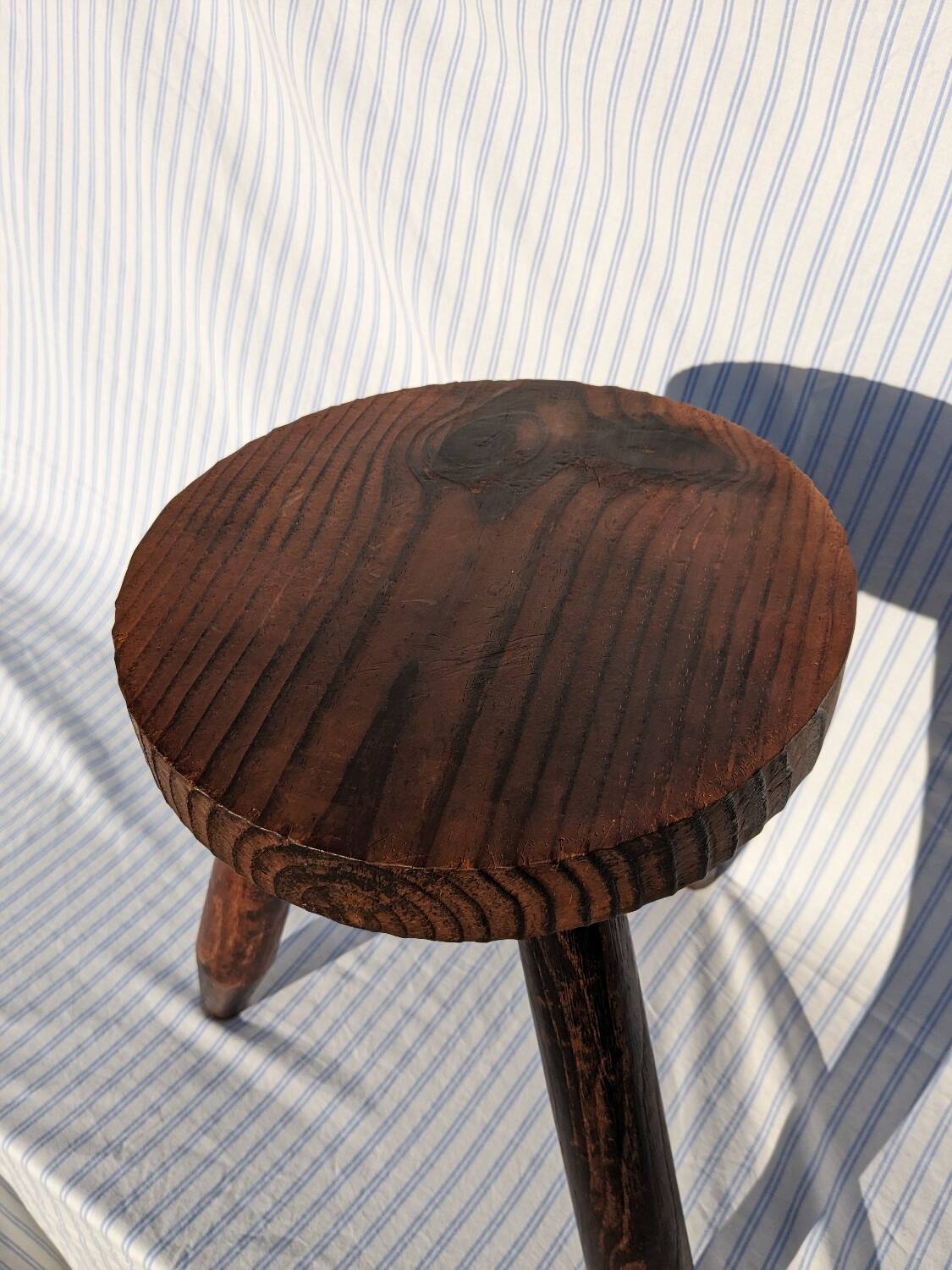 Wooden tripod stool
