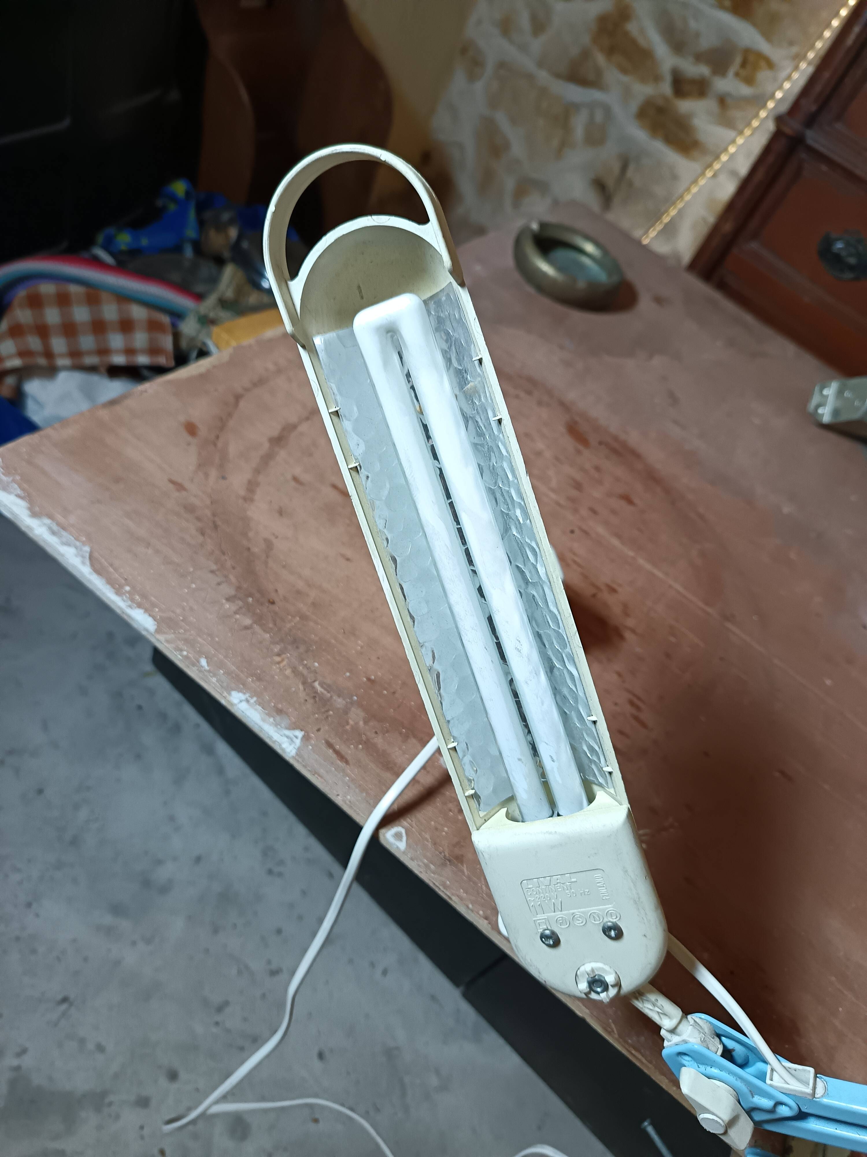 Articulated blue desk lamp