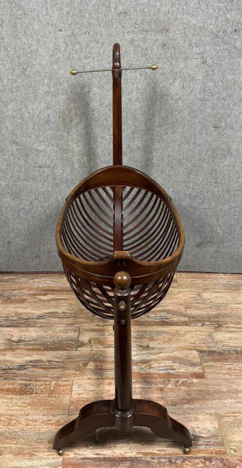 Empire style mahogany cradle with a swan neck, shaped like a cradle, circa 1810