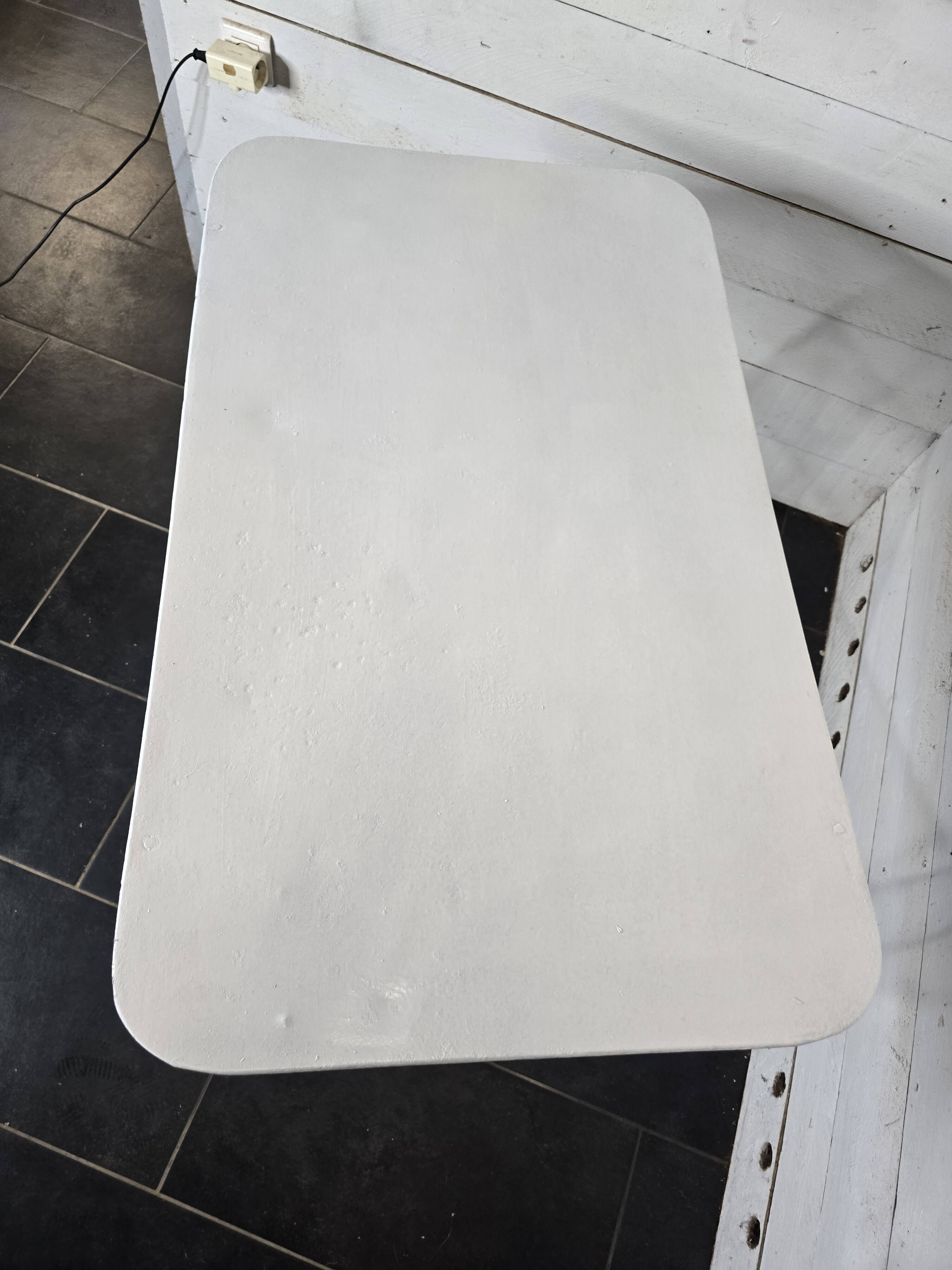 Old folding wrought iron garden table