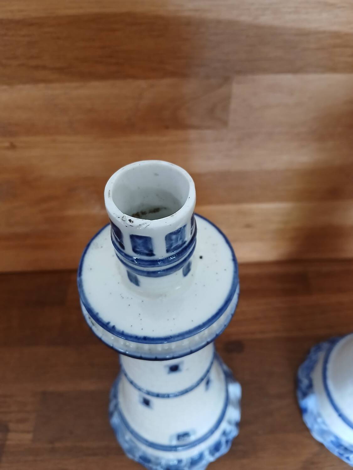 Pair of lighthouse-shaped candle holders