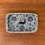 Vintage handmade blue ceramic ashtray with deer and flower ornament from Rodos Ceramics.