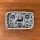 Vintage handmade blue ceramic ashtray with deer and flower ornament from Rodos Ceramics.