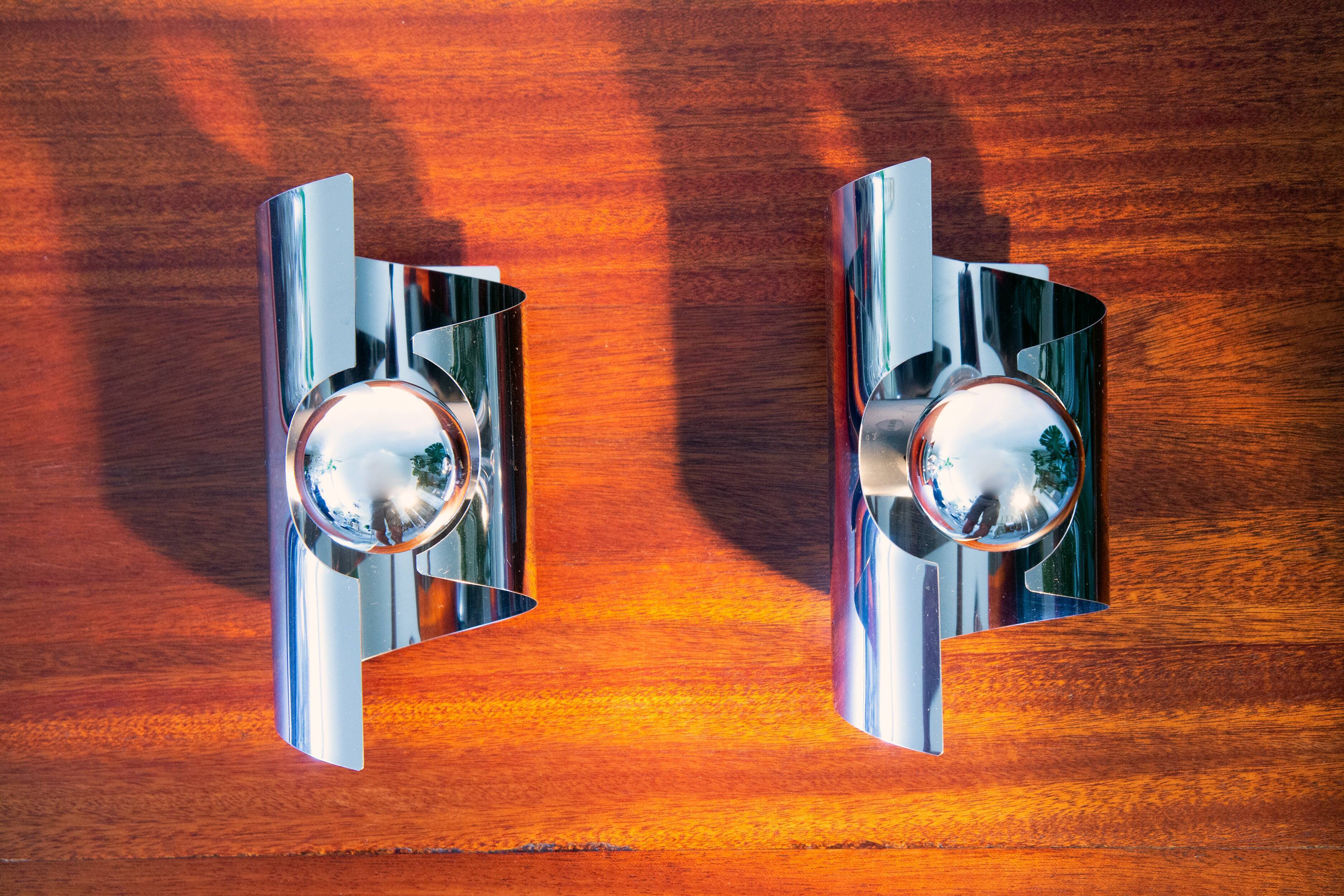 Pair of twisted wall lamps, chromed steel, year 70