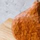 Hand-carved soliflore vase in solid cherry wood.