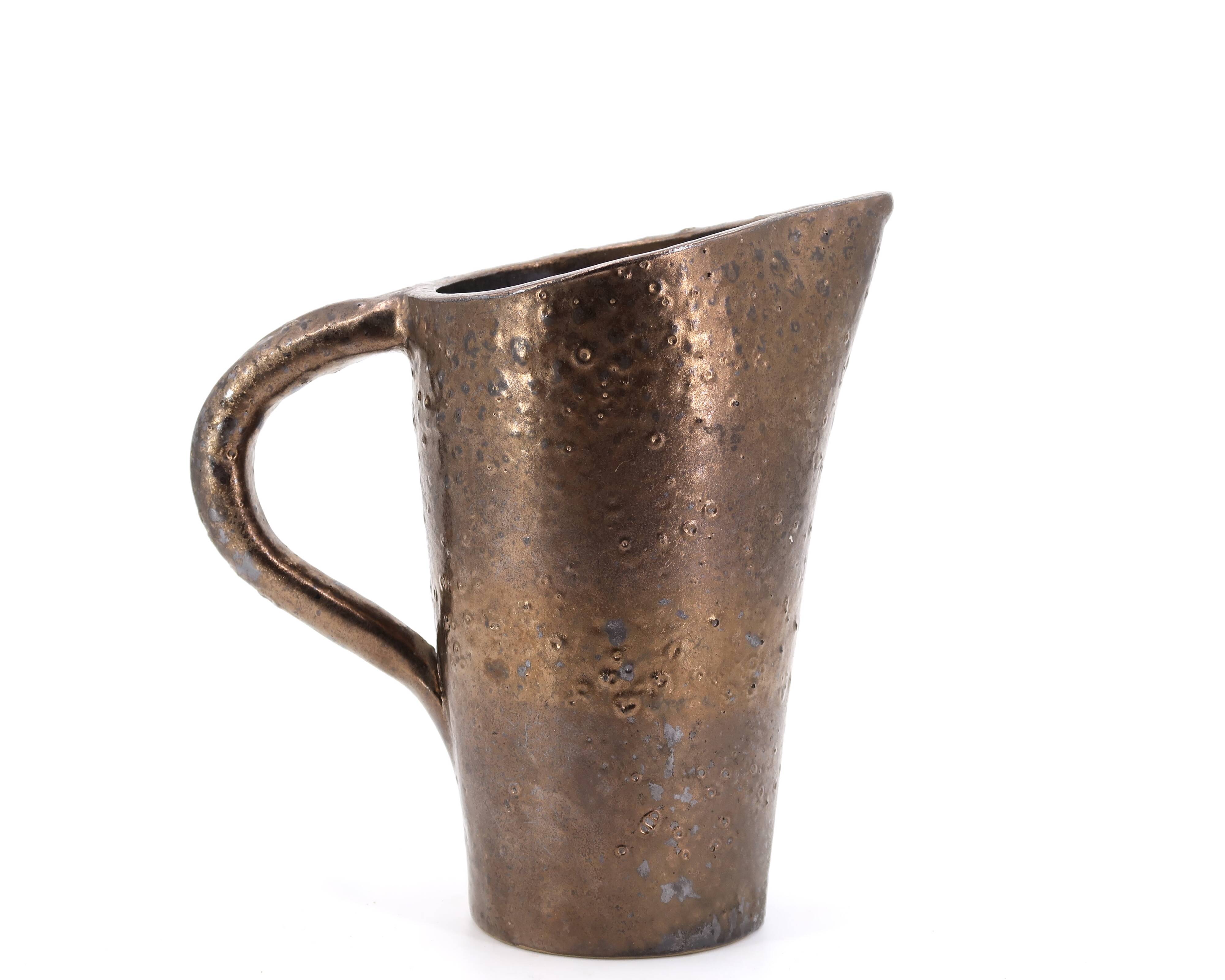 Golden ceramic pitcher, 1950s