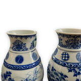 Pair of Asian vases in white and blue porcelain