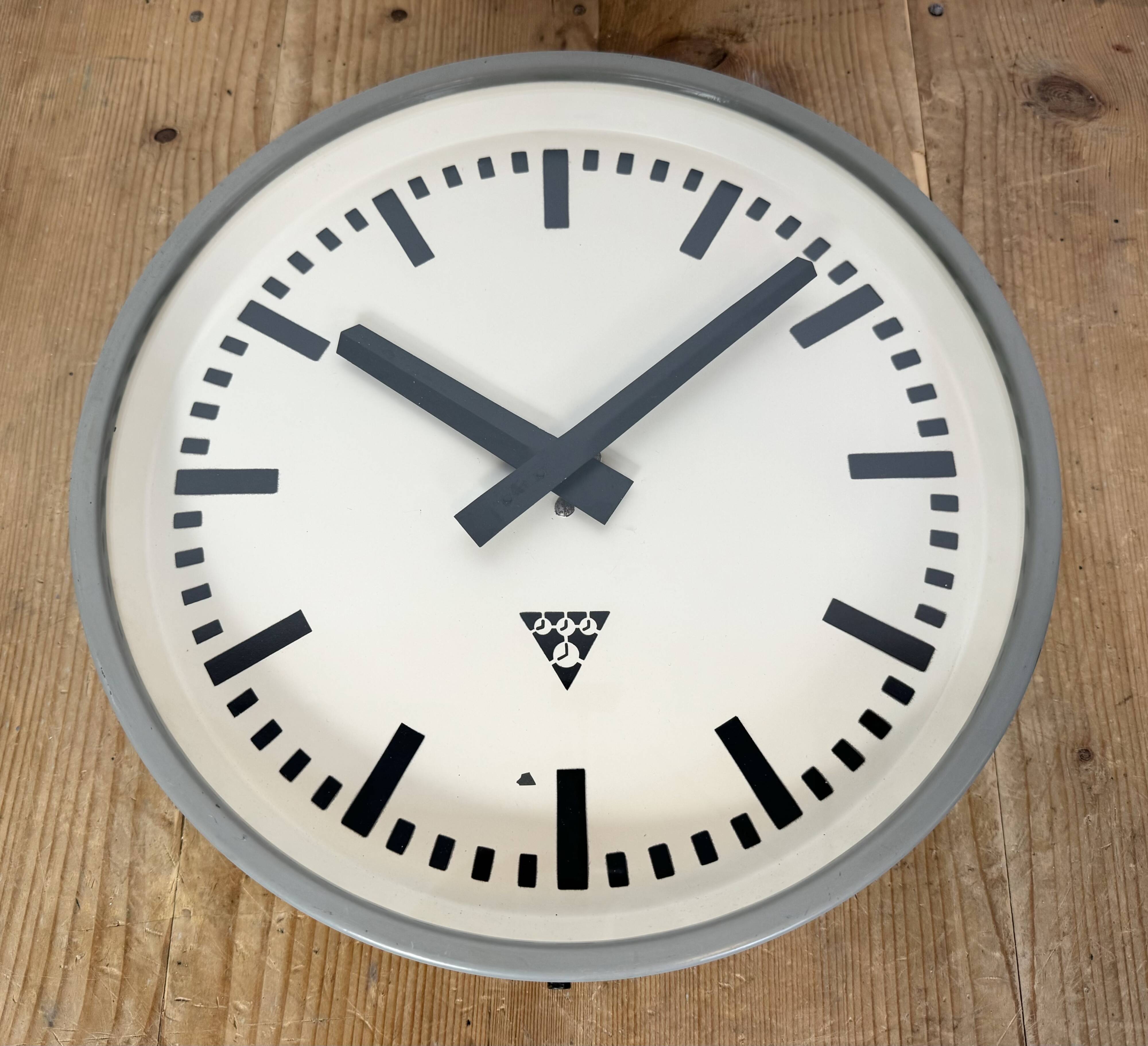 Industrial grey factory wall clock from pragotron, 1960s