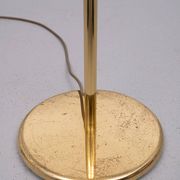Holtkoetter adjustable Brass swing arm floor lamp. Germany