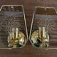Pair of glass and metal wall lights