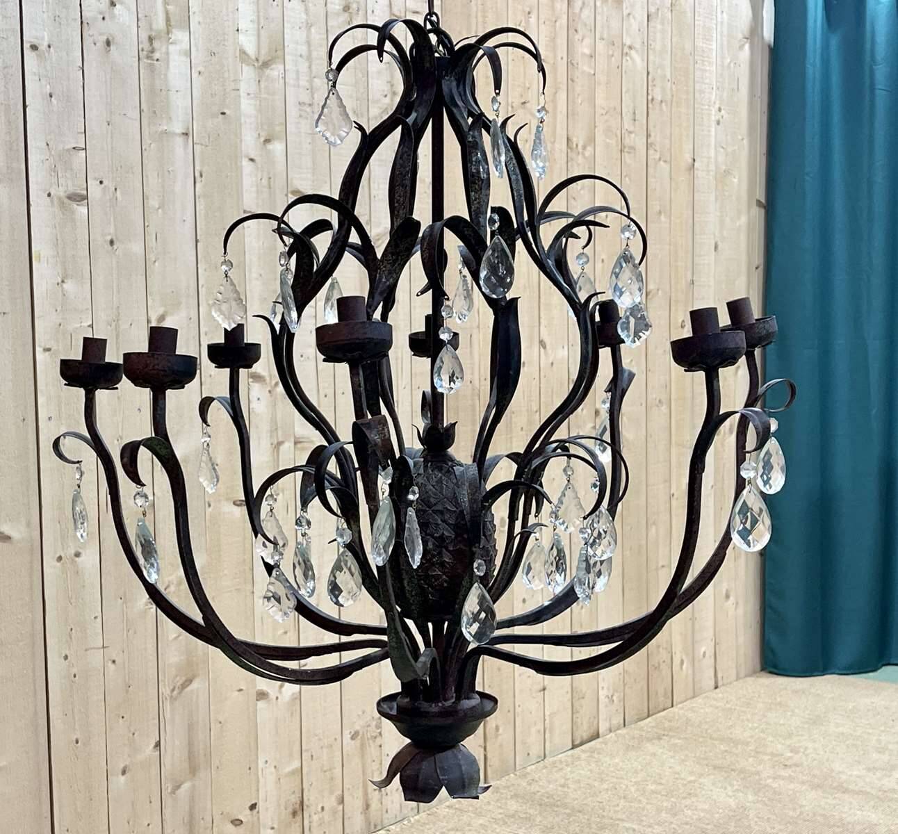Large pineapple chandelier in blackened metal and tassels
