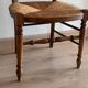 Chaise basse « nourrice » paillée vintage