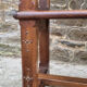 Stylized church pew, early twentieth century, solid wood