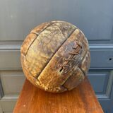 Mid-20th century leather soccer ball with visible stitching and beautiful patina