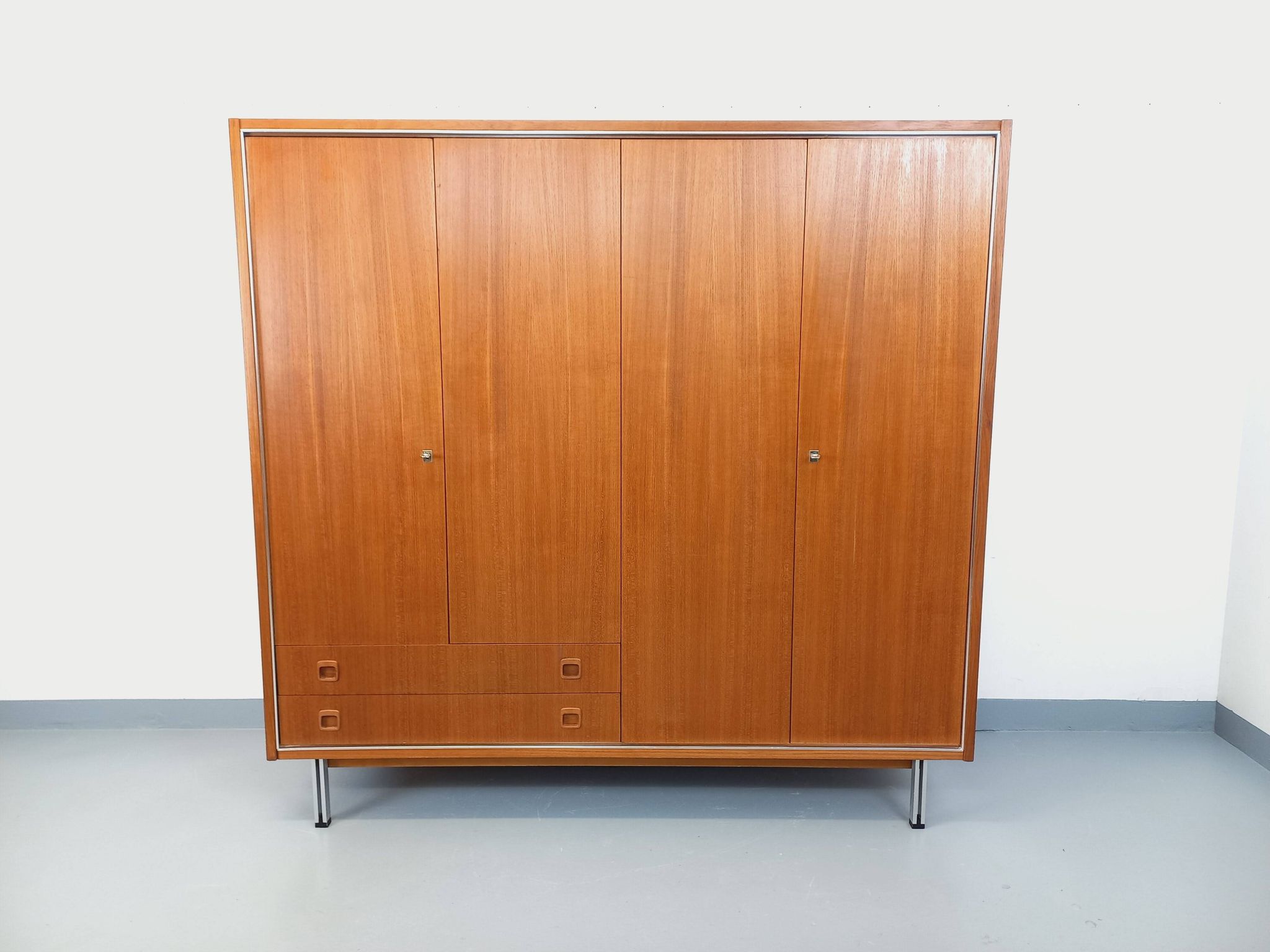 Vintage Scandinavian modernist wardrobe in teak and metal from the 1960s.