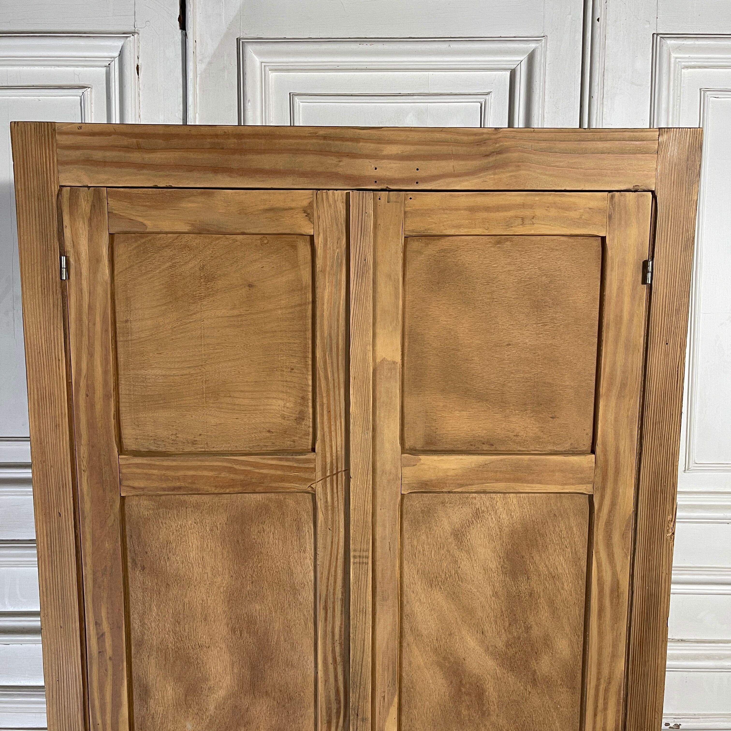 Parisian wardrobe in raw wood