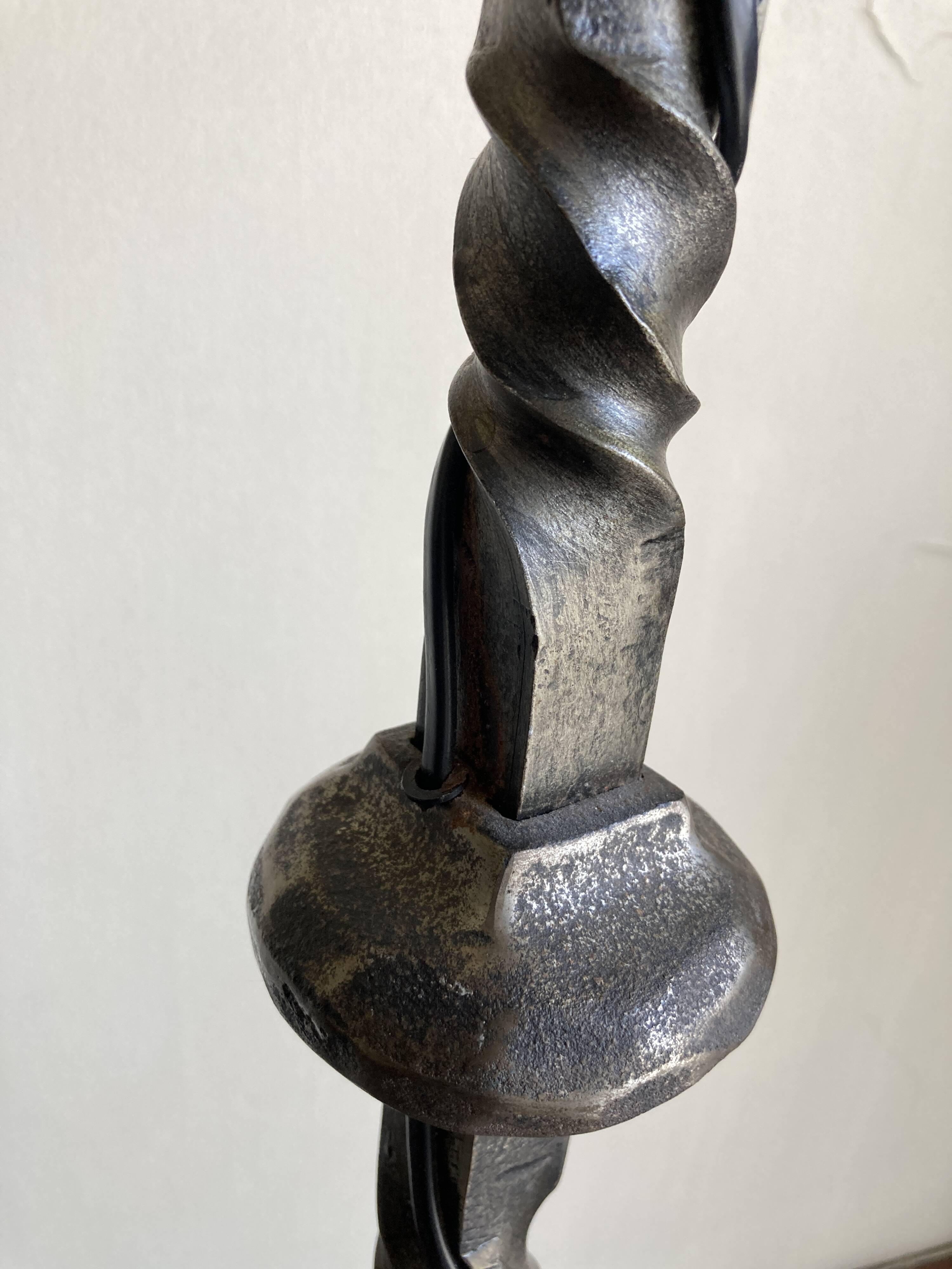 Floor lamp in beaten iron and bronze Artisans de Marolles 1960
