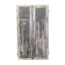 Pair of old shutters with louvers