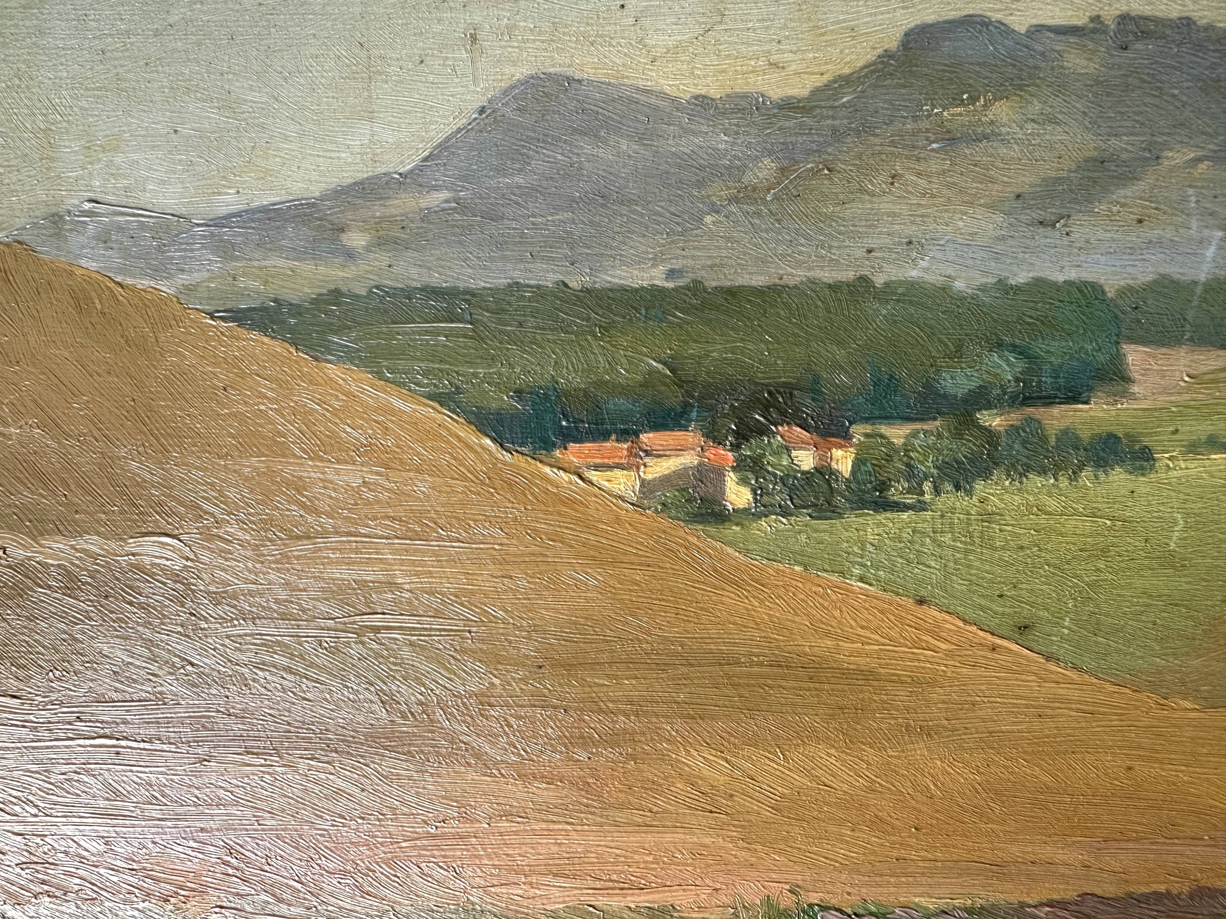 Old oil painting of a landscape on panel from 1920, haystacks.