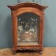 Small Louis XV mahogany display case with periwinkle legs
